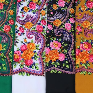 May include: Four fabric swatches with floral patterns. The swatches are green, white, black, and gold. Each swatch has a different floral pattern with a paisley design.