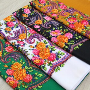 May include: Four fabric squares with a paisley floral pattern. The squares are in different colors: green, white, black, and yellow.