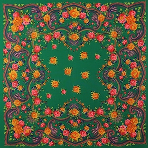 May include: A green square scarf with a paisley pattern and floral designs in shades of red, orange, and yellow.