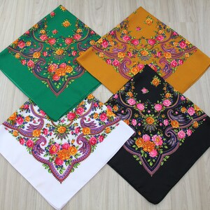 May include: Four square patterned scarves in different colors: green, yellow, black, and white. Each scarf features a floral design with pink, orange, and purple flowers.