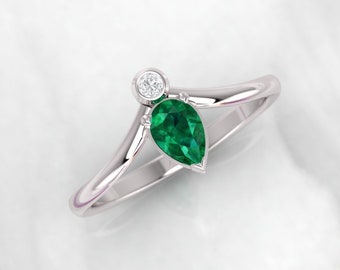 Emerald engagement ring. Diamond ring. Pear shape emerald ring. 14K, 18K, white, yellow or rose gold. Available in platinum.