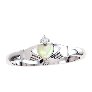 Claddagh ring. Opal and diamond claddagh ring. Available in 9K, 14K, 18K, white, yellow or rose gold. Also in Platinum.