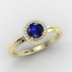 Sapphire  engagement ring. Antique inspired Sapphire and Diamond ring. Available in 14K or 18K yellow, white or rose gold.