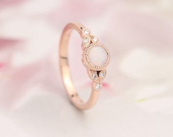 Opal engagement ring. Opal and diamond ring. Rose gold opal ring. Rose gold engagement ring.