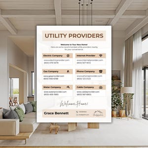 May include: A beige and white informational poster titled "UTILITY PROVIDERS" with contact details for electric, gas, water, internet, phone, and cable companies. The poster includes the text "Welcome to Your New Home!" and a signature.