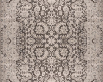 May include: A vintage-style rug with a brown and cream colour scheme. The rug features a repeating floral pattern with intricate details.