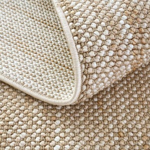 neutral beige area rug with unique woven technique