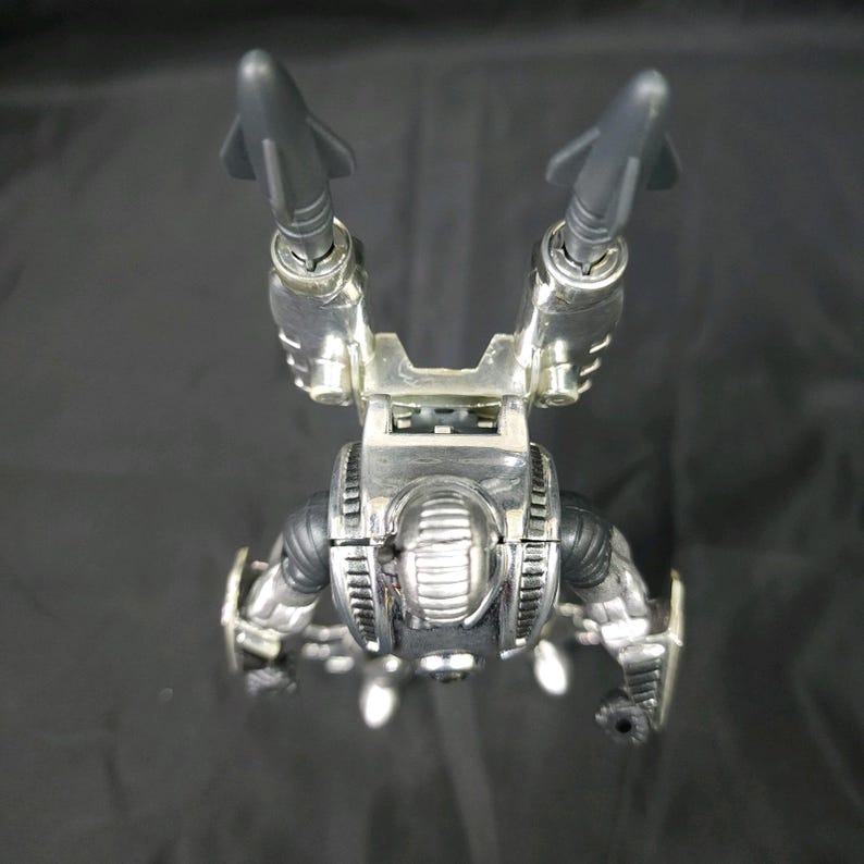 Figura de acción de Iron Man War Machine de Toy Biz Marvel con cañones en funcionamiento imagen 3
