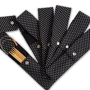 Knitting Needle Sleeve with 2 pockets.  Keep DPNs with your circular needle of the same size all in one case. Black with white polka dots.