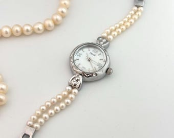Zoetwaterparelarmbandhorloge: minimalistisch zilver roestvrij staal