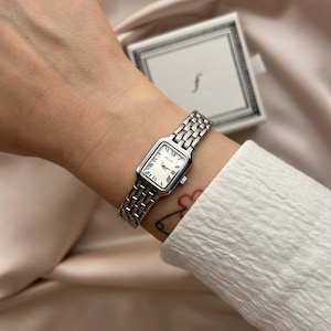 Silberne Damenuhr, minimalistisches, elegantes Gesicht, zierliche Kleideruhr, rechteckiges zierliches Zifferblatt, Vintage-inspiriert