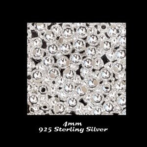 May include: A close-up image of a large quantity of small, round, silver beads. The beads are 4mm in diameter and are made of 925 sterling silver.