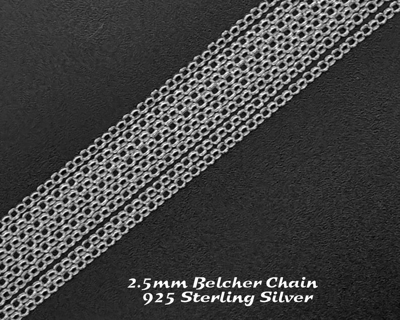 May include: A close-up of a silver 2.5mm Belcher chain made of 925 Sterling Silver. The chain is laid out on a black surface.
