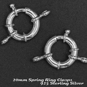 May include: Two silver 20mm spring ring clasps made of 925 sterling silver.