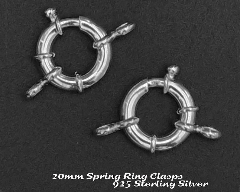 May include: Two silver 20mm spring ring clasps made of 925 sterling silver.