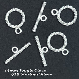 May include: Five silver toggle clasps, each with a twisted rope design. The clasps are 15mm in size and made of 925 sterling silver.