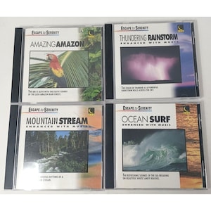 以下が含まれることがあります： 「Escape to Serenity」CDケース4枚セット。オウムの「Amazing Amazon」、稲妻の「Thundering Rainstorm」、森の川の「Mountain Stream」、打ち寄せる波の「Ocean Surf」が描かれています。各ケースには説明文が記載されています。