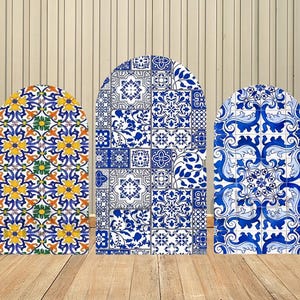 May include: Three arched panels with intricate tile designs. The panels feature patterns in yellow, blue, and white. The tiles have floral and geometric motifs, creating a decorative and artistic display. The panels are set against a neutral background.
