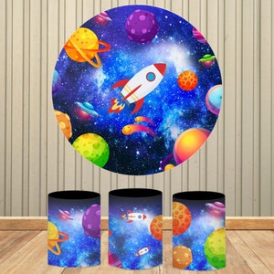 May include: Three round, blue and black can coolers with a space theme. The coolers feature a rocket, planets, stars, and a UFO.