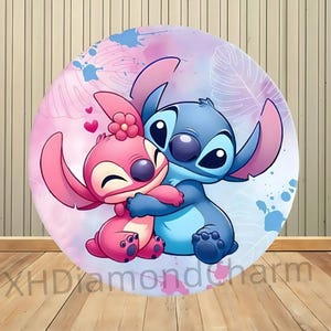 May include: A round graphic featuring the characters Stitch and Angel from Lilo & Stitch. Stitch, in blue, hugs Angel, who is pink, against a pastel background with hearts and splashes. The text "XHDiamondcharm" is at the bottom.