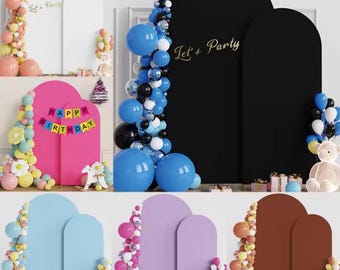 May include: A collection of arched backdrop panels in various colors, including white, pink, blue, and brown. Each panel is decorated with balloon garlands in coordinating colors. Some panels have text that reads "Let's Party" and "Happy Birthday".