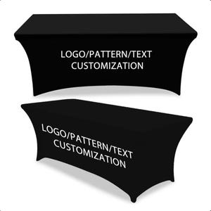 May include: Two black fitted table covers. The covers have a curved design and are shown from two different angles. The text "LOGO/PATTERN/TEXT CUSTOMIZATION" is printed in white on the front of each cover.