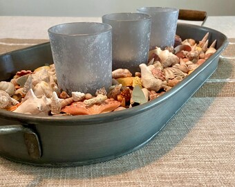 Handmade votive or tea light candle scape coastal centerpiece with seashells and seaglass.