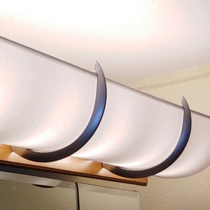 30" Smooth Bright White Shade hides those Hollywood Lights Beautifully! Comes with 2 metallic finish brackets