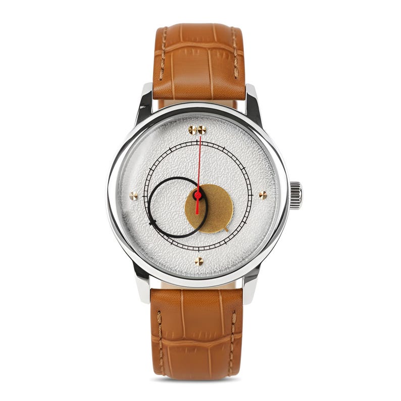 May include: A silver wristwatch with a white face featuring a black and gold design, a red hand, and gold accents. The watch has a brown leather band with a crocodile pattern.