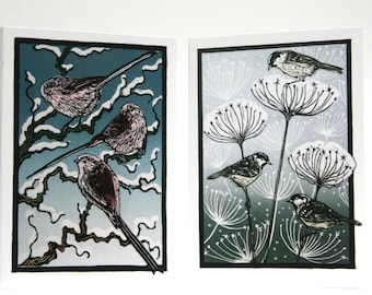 Pack of 8  Christmas cards, blank inside,  featuring 2 designs of snowy garden birds