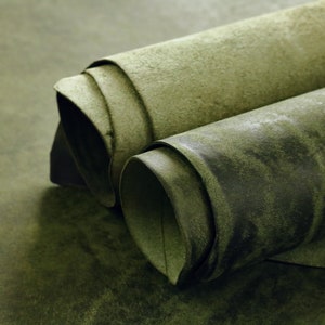 Dark green Italian full grain vegetable tanned leather sheets for sale. Can be used for wallets, cases and other small products