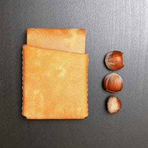 Monogramed, thin leather wallet for credit cards and folded cash - made by hand in the EU