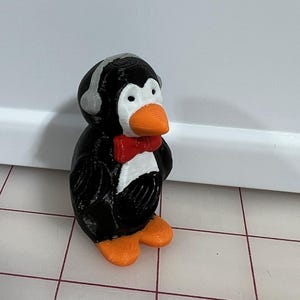 Pooping penguin Toothpaste Topper (Color) (fits most toothpaste tubes)
