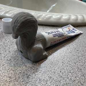 Pooping squirrel Toothpaste Topper (fits most toothpaste tubes)