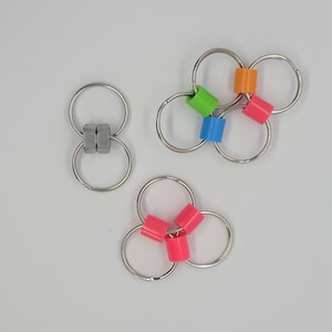 Sleutelhangerfidgets - 3 stijlen en 16 kleuren!