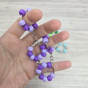 Brinquedo antiestresse com anéis interligados - Conta redonda