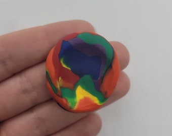 Piedra de preocupación arcoíris para dedos