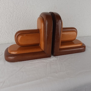 Art deco houten boekensteunen Amsterdamse school