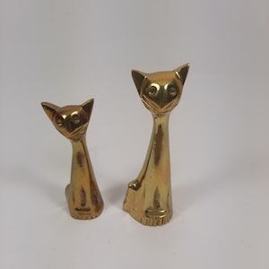 Messing beeldjes van kattenfiguren