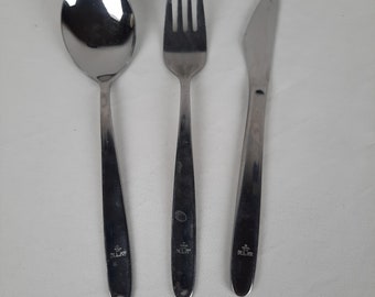 May include: A set of three silver-toned cutlery pieces: a spoon, a fork, and a knife. Each piece has the word "KLIP" engraved on the handle.