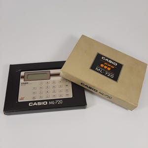 Casio ML-720 electronic calculator, nieuw inclusief doos, etui en handleiding