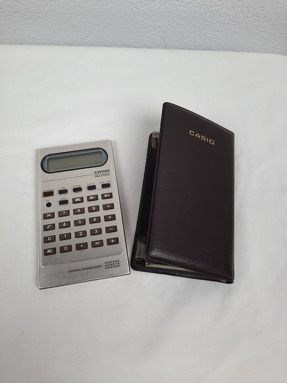 Casio AQ 2000 Scientific Calculator 1970 Inclusief Hoes Japan Etsy Canada