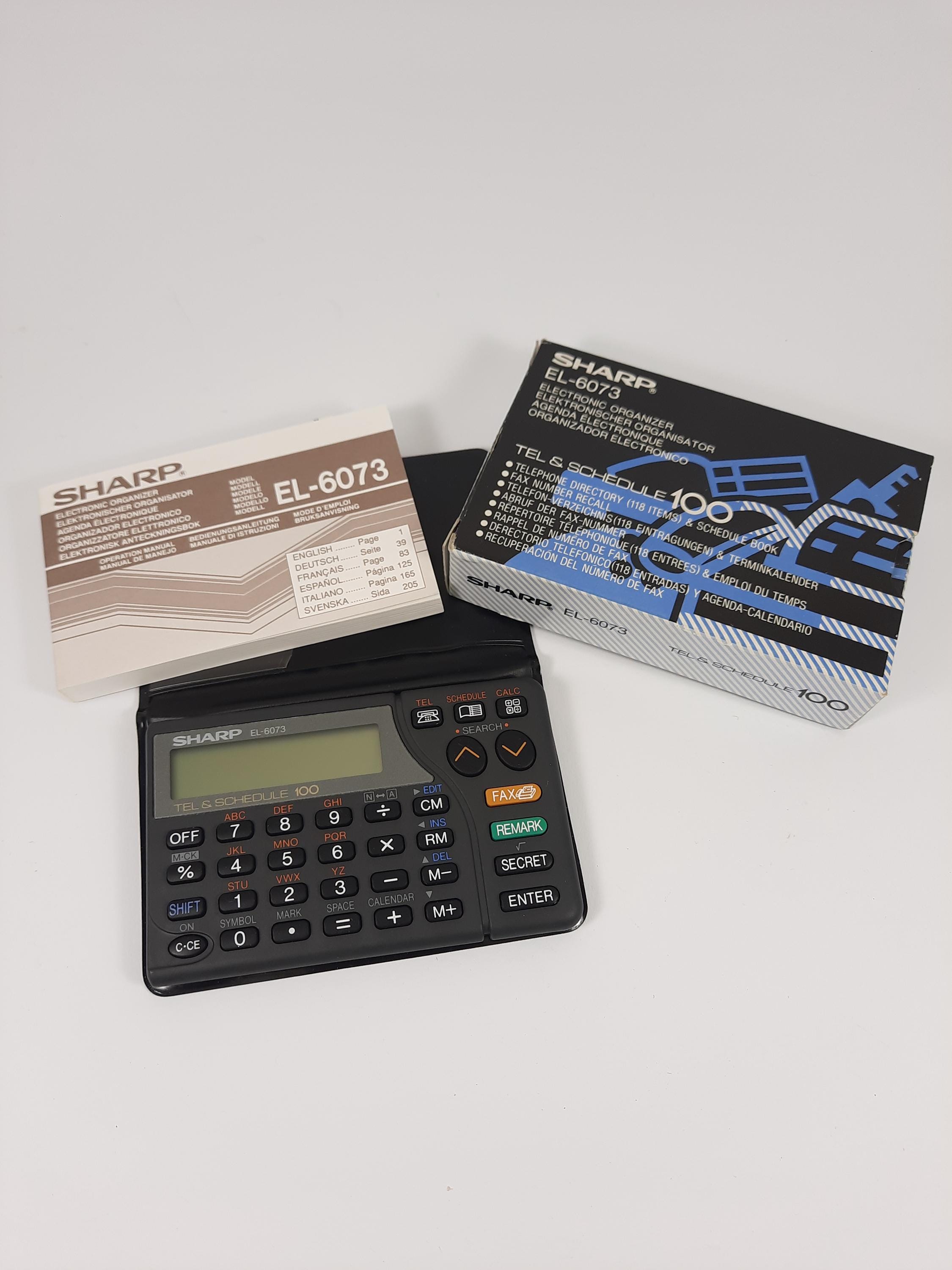 Sharp EL-6073 electronic organizer, nieuw inclusief doos, etui en handleiding