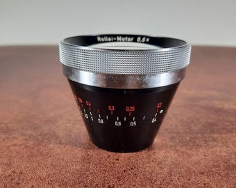 Rolleiflex SL35M with Rollei Planar 50mm f/1.8. The real gem of