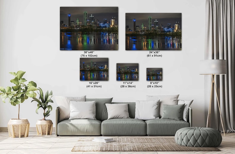 May include: A collage of five different sizes of a photograph of the Austin, Texas skyline at night. The skyline is lit up in blue, green, and white lights, reflecting in the water below. The image is available in sizes ranging from 8x10 inches to 30x40 inches.