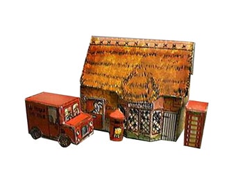 May include: A miniature paper model of a quaint village scene. The scene includes a red delivery truck, a thatched-roof building, a red mailbox, and a red telephone booth. The building has detailed windows and a door.