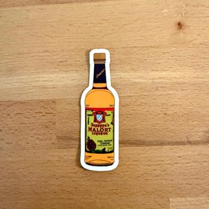 May include: A sticker in the shape of a bottle of Jeppson's Malört Liqueur. The sticker is orange with a brown cap and a label featuring text and a crest. The text includes "Jeppson's Malört Liqueur" and "Carl Jeppson Company Chicago, USA."