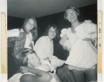 Slumber Party! Girls goofing around in their pajamas. August 1965. Vintage original black & white vernacular snapshot photo.