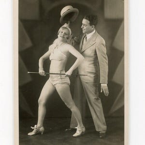 Vaudeville performers in stage publicity photo. Couple in theatrical pose. 1920s-1930s. Vintage original black & white vernacular snapshot.