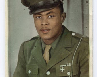 Vintage hand-colored portrait of Black U.S. Army serviceman. Unidentified. Vintage original 5 x 7 military hand-tinted studio photograph.